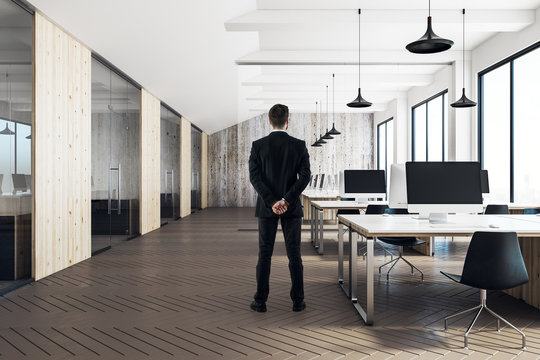 Man in modern coworking office interior