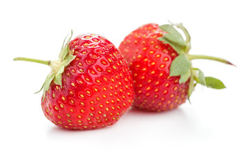 two berries of ripe juicy strawberries