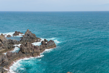 Waves cruching on the rocks