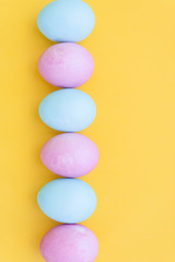 easter eggs on yellow background