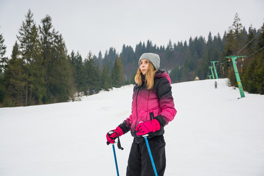 A young girl skiing in the mountains in Pylypets, in Transcarpathia