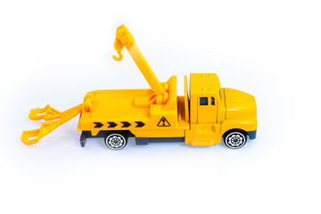 Obraz na płótnie Canvas towing truck toy on a white background