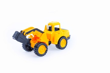 Toy construction vehicles Excavator industrial machine doing construction new road earthworks on white background