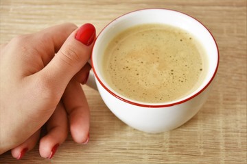 girl with a cup of coffee