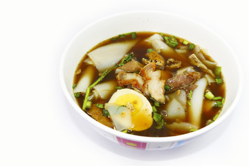 thai noodle soup with pork on plate isolate white background 