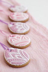 Homemade gingerbread Easter lilac and pink color in the form of egg with a floral pattern.