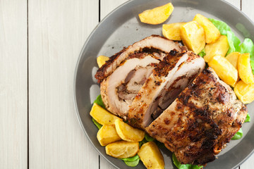 Roasted pork roll stuffed with other meat