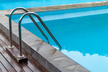 A stair at swimming pool side