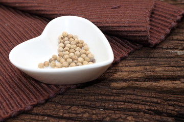 Herb ingredient of Tom Yum spicy soup Traditional Thai food cuisine on wood background