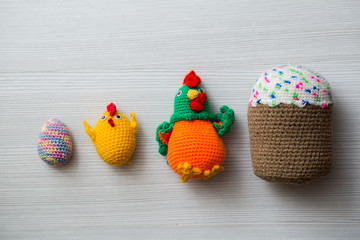 Knitted Easter eggs, chicken, rooster.