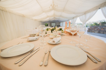 Beautiful Banquet hall under a tent for a wedding reception.