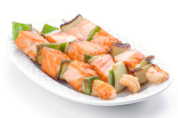 grilled salmon skewers in white font, isolated on white