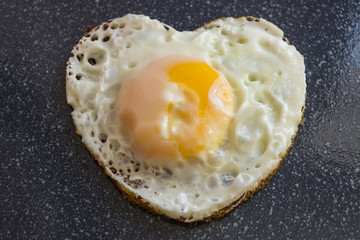 Egg in the shape of heart.