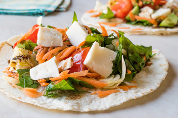 Homemade Vegetarian Tostadas with Salad, Cheese and Grated Carrot Slices