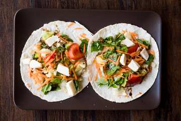 Homemade Vegetarian Tostadas with Salad, Cheese and Grated Carrot Slices