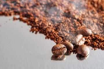 Grains of coffee with a smoking aroma