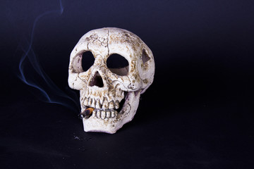 A smoking skull with cigarette in his mouth