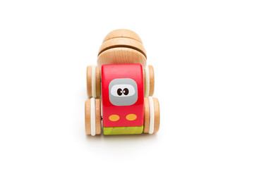 Wooden toy concrete mixer on a white background. Isolated