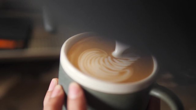 Barista Drawing Latte Art on Coffee with Soy Milk. Process of Making Vegan Lactose Free Drink in Coffeeshop. 4K, Slowmotion Macro Cinematic Closeup.