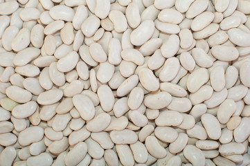 uncooked dry white bean closeup background