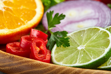 Bowl with oatmeal flakes served with fruits on wooden tray wooden background, flat lay, selective focus
