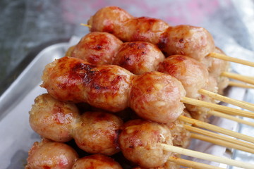 Deep fried sausages of fermented pork and glutinous rice northeastern Sai Krok Isaan Thai food