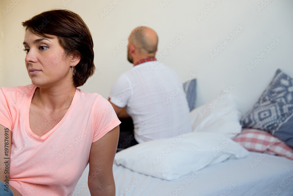 Wall mural Sad couple having relationship problems