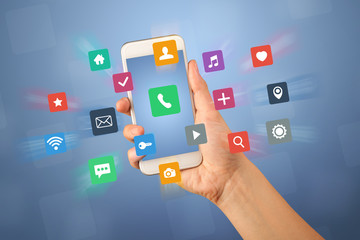 Female fingers touching smartphone with colorful applications