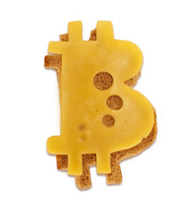 A slice of cheese in the form of bitcoin on toasted toast. Edible bitcoin.