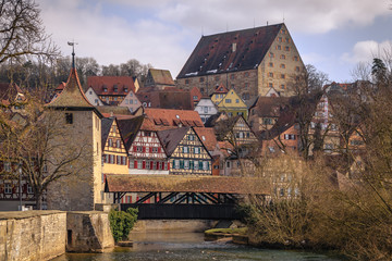 Fototapeta na wymiar Cityscape with old, half-timbered buildings in romantic medieval town of Schwäbisch Hall in Baden-Württemberg, Germany