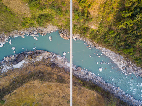 Drone view of the suspension bridge over the Kali Gandaki river between Kushma and Balewa in Nepal