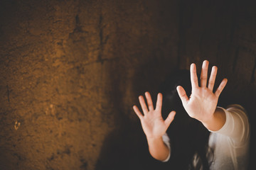 Woman bondage in angle of abandoned building image blur , stop violence against Women,...
