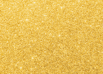 Gold glitter texture sparkling shiny wrapping paper background for Christmas holiday seasonal wallpaper  decoration, greeting and wedding invitation card design element