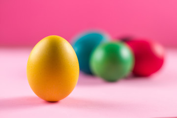 Fototapeta na wymiar Easter colorful eggs on the bright backgroun