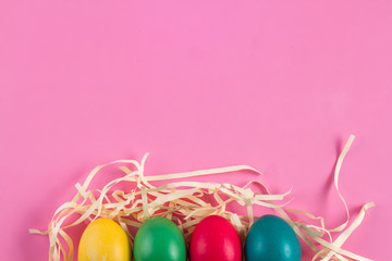 Easter colorful eggs on the bright backgroun