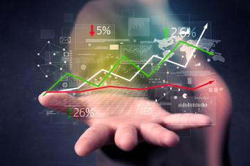 Detailed financial plan in the hands of a young casual businesswoman