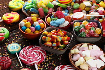 candies with jelly and sugar. colorful array of different childs sweets and treats.