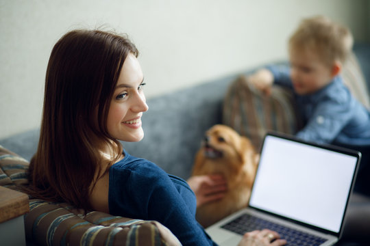 Girl Working At Home At Computer