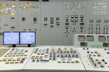 The central control room of nuclear power plant. Fragment of nuclear reactor control panel.