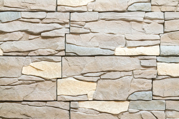 Beige decorative stone for wall decoration. background