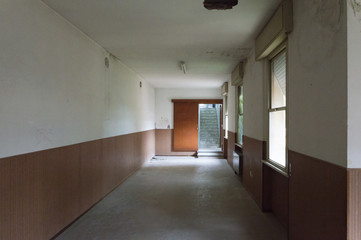 Internal room of old and abandoned devastated school, ready for renovation