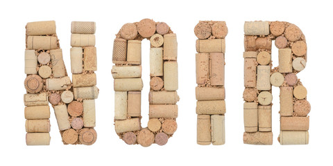 Word Black in french Noir made of wine corks isolated on white