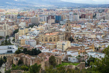 Fototapeta na wymiar Cityscape aerial view of Malaga, Andalucia, Spain. The Cathedral of Malaga