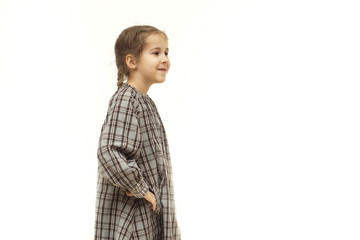 Full length portrait of a happy little girl on white background