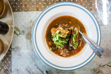 Khanom Jin Nam Ngiao , or Noodle soup