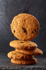 Sweet cookies arranged in pattern on textured background, close-up, shallow depth of field, selective focus.