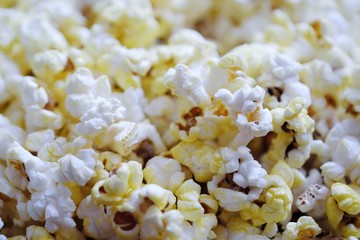Fresh delicious popcorn with cheese close up