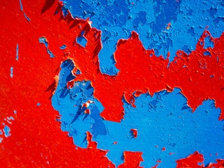 A close up to all the colors that had been painted on a small wooden boat on the beach of Amorgos