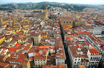 Fototapeta na wymiar Aerial view of Florence old town from top of Florence Cathedral ( Cathedral of Saint Mary of the Flower ) Panoramic Aerial view from the top of Florence cathedral in Florence Italy ~ 