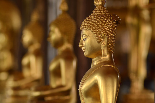 Golden of buddish state in the art style ,Wat Krathum Suea Pla temple ,Bangkok